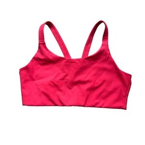 Girlfriend Collective sports bra crossback in limited edition color geranium